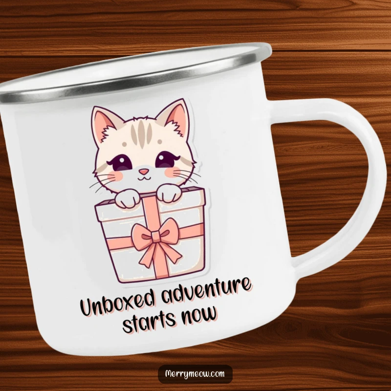 Funny camping mug with an adorable cat peeking from a decorated gift box, designed for outdoor fun and cat lovers.