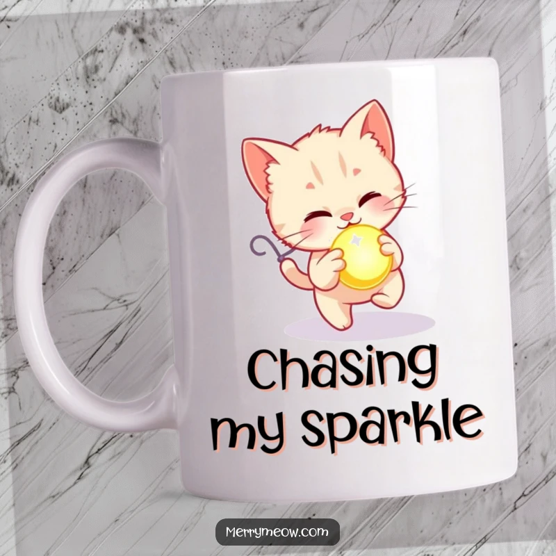 Funny mug featuring a kitten happily chasing a glowing, festive ornament, embodying playful holiday excitement.