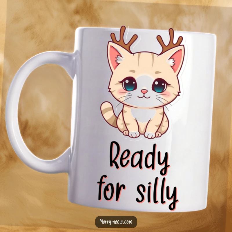 Funny mug showcasing a cute cat character wearing tiny, festive reindeer antlers, looking adorably festive and slightly bewildered by the holiday getup.