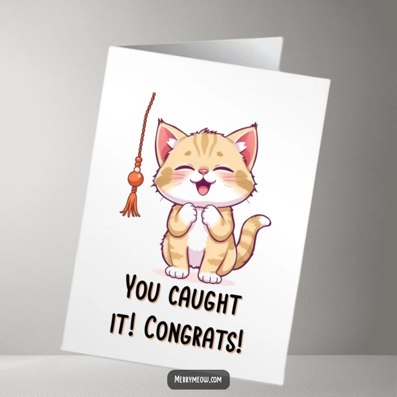 Funny free printable congratulations card: a kitten enthusiastically playing with a festive dangling tinsel garland.