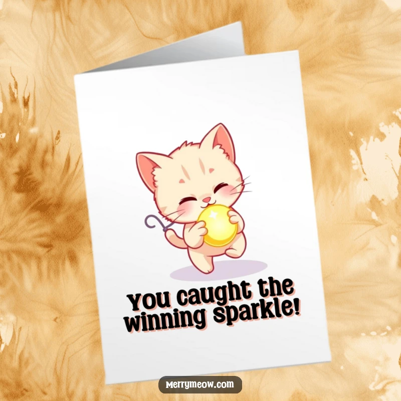 Free Printable Kitten Congratulations Card: A kitten joyfully chases a glowing ornament, celebrating your wonderful news.
