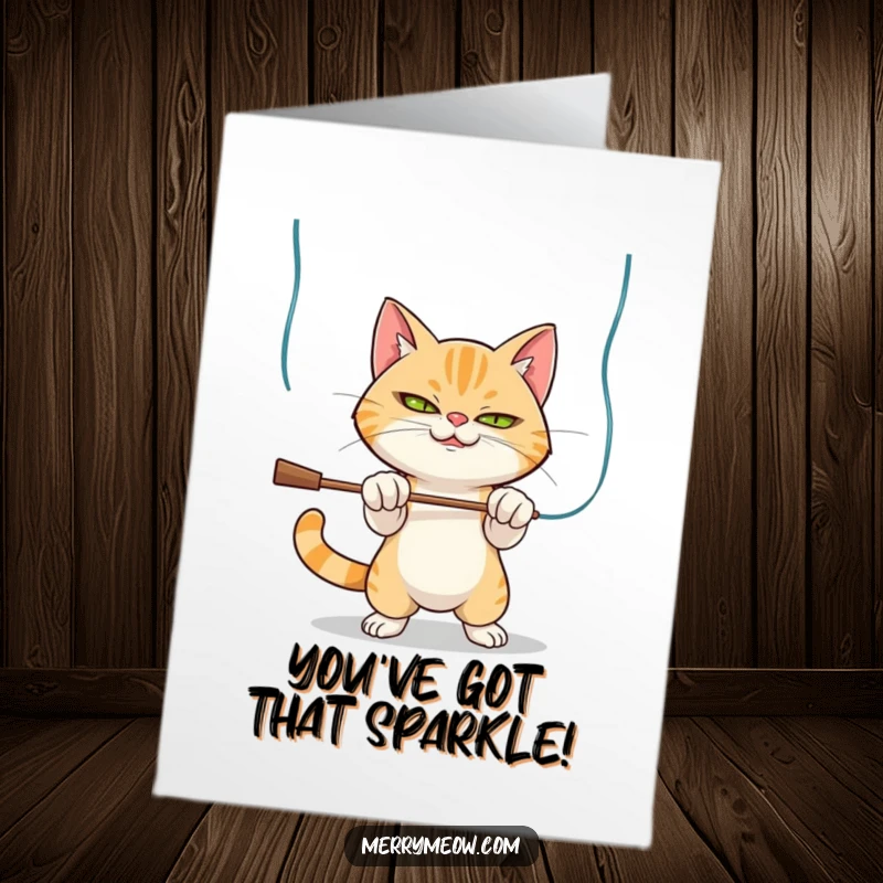 Funny Free Printable Congratulations Card: Mischievous cat batting at tinsel, celebrating your success with playful energy.