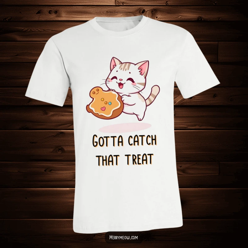 Funny Kawaii Cat T-Shirt illustrating a cute cat gleefully pouncing on a runaway gingerbread cookie, full of energy.